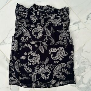 Express tank/blouse. Navy blue/cream paisley with ruffled neck/sleeves. Small